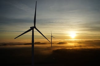 Wind turbines above the clouds at Cross Winds® Energy Park.  Consumers Energy is erecting 19 more turbines in phase II, planned to be operating commercially in January 2018.