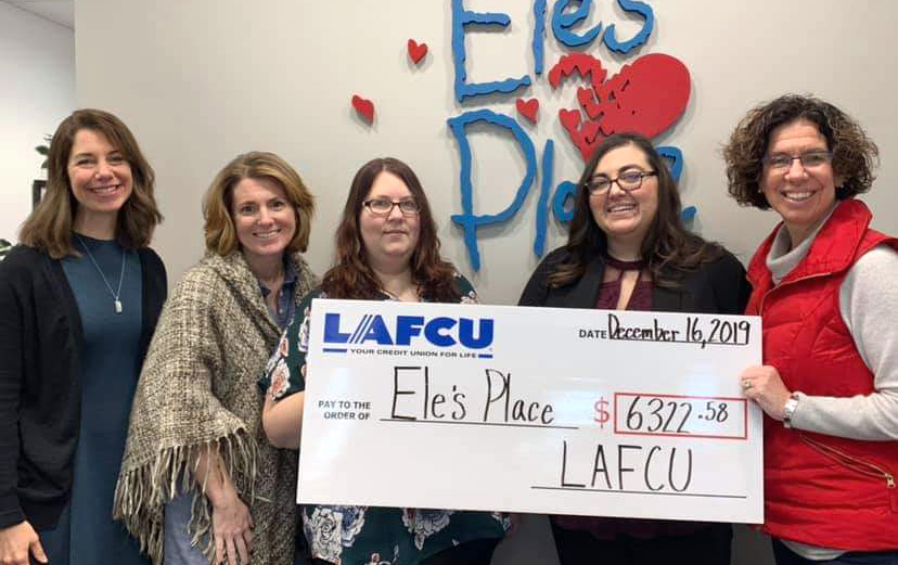LAFCU-ElesPlace.jpg – At the LAFCU Giving Committee/Ele’s Place-Capital Region check presentation are, from left, Dawn Haddad and Cindy Kangas, Ele’s Place; Teri and Amanda Seger, LAFCU; and Kristine Kuhnert, Ele’s Place. LAFCU and its employees donated $6,322.50 to support Ele’s Place.