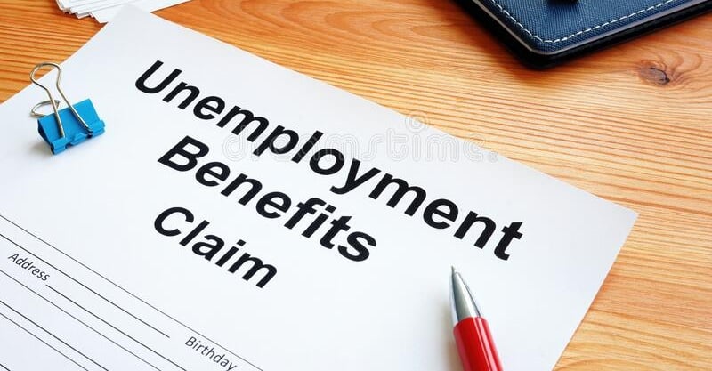 unemployment-benefits-claim-stack-documents-179827671 Cropped
